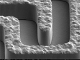 Development of a High-Density Adaptive Redistribution Technology for Embedded High I/O Components